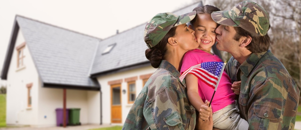 Military Family in Front of New House